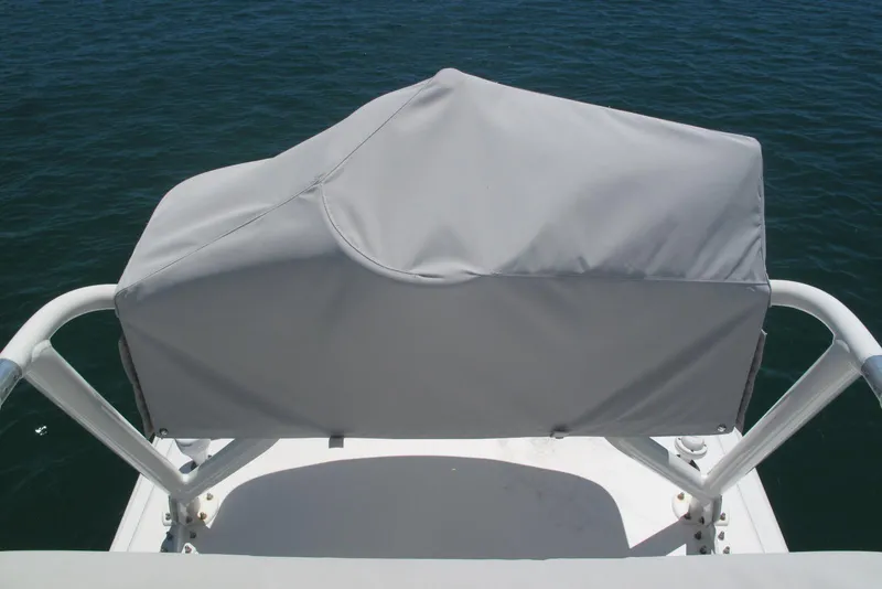 Slide: The Image of Covered helm station on 2024 SeaVee 370z boat, overlooking calm ocean waters. - 10
