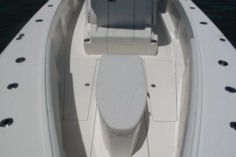 Slide: The Image of 2024 SeaVee 370z boat interior with sleek seating and spacious deck design. - 12