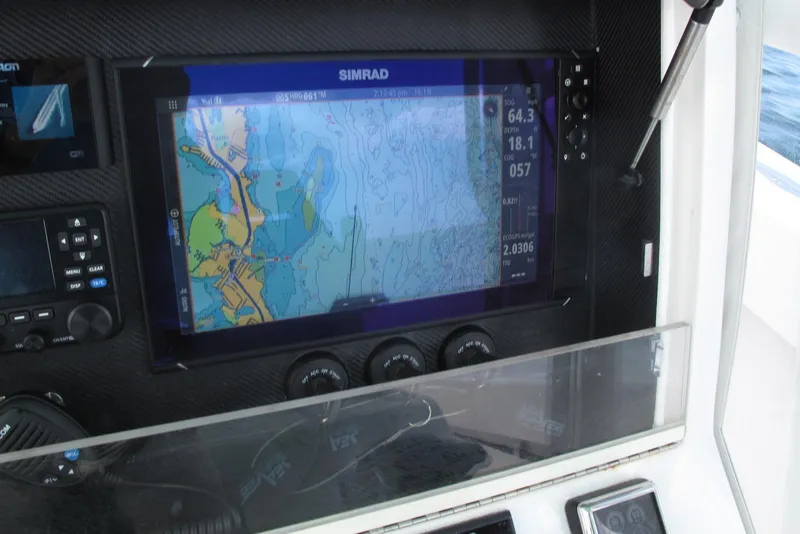Slide: The Image of Simrad navigation display on 2024 SeaVee 370z boat dashboard. - 20