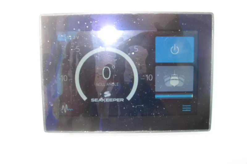 Slide: The Image of Display screen of 2024 SeaVee 370z showing Seakeeper roll angle at 0 degrees. - 23