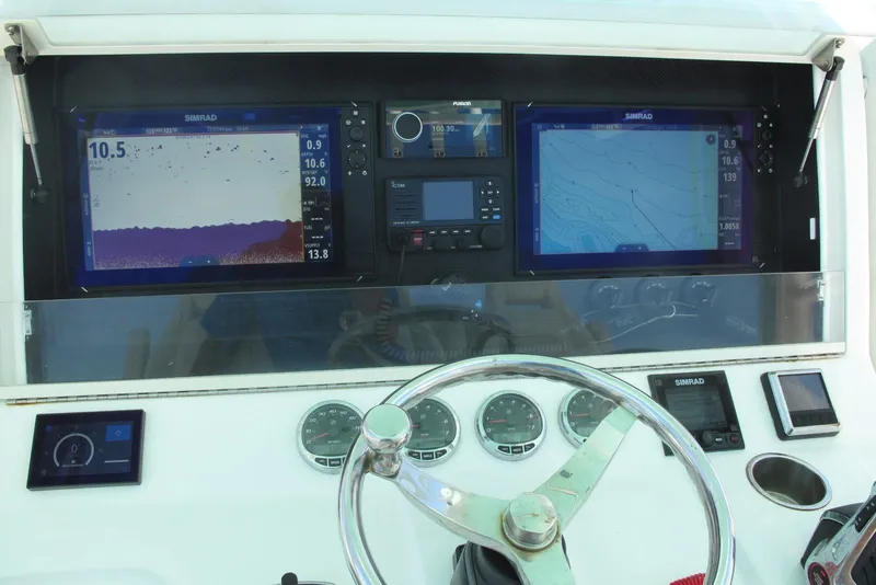 Slide: The Image of 2024 SeaVee 370z dashboard with navigation and control instruments. - 7