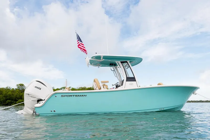 Slide: The Image of 2026 Sportsman Heritage 231 Center Console boat interior with modern helm and seating. - 1