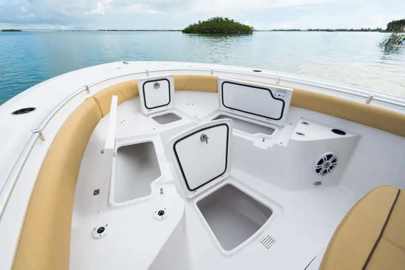 Slide: The Image of 2026 Sportsman Heritage 231 Center Console boat interior with steering wheel and controls. - 3