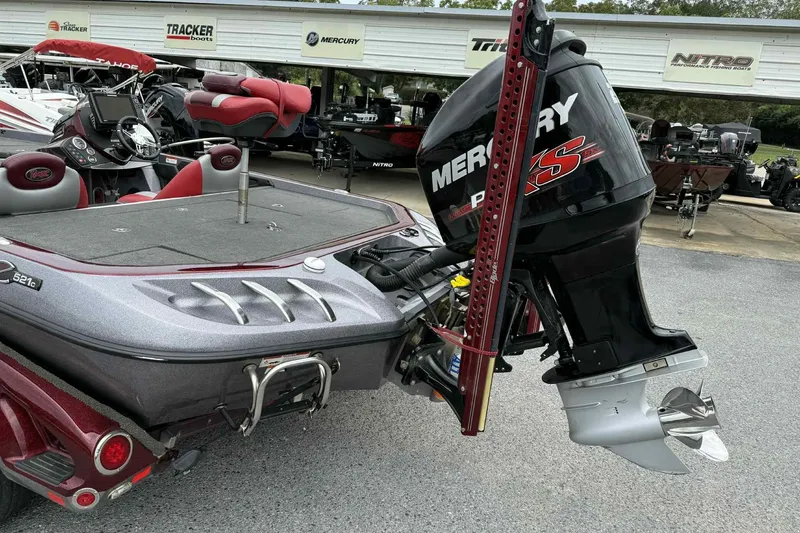 Slide: The Image of 2014 Ranger Z521 Comanche boat with Mercury Pro XS engine, parked at dealership. - 13