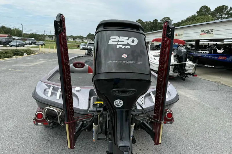 Slide: The Image of 2014 Ranger Z521 Comanche boat with 250 Pro engine in a dealership lot. - 14