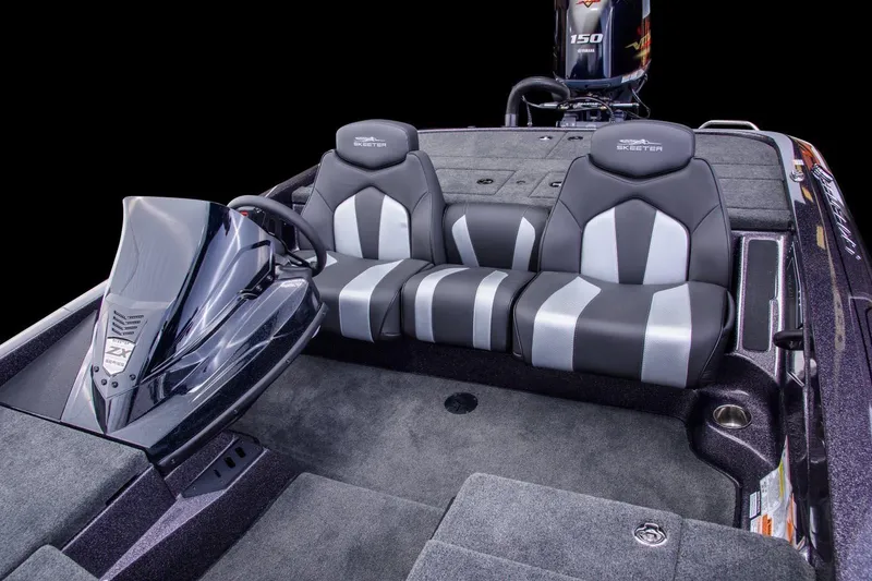 Slide: The Image of Manufacturer Provided Image: 2024 Skeeter ZX150 boat interior with sleek seating and modern dashboard design. - 5
