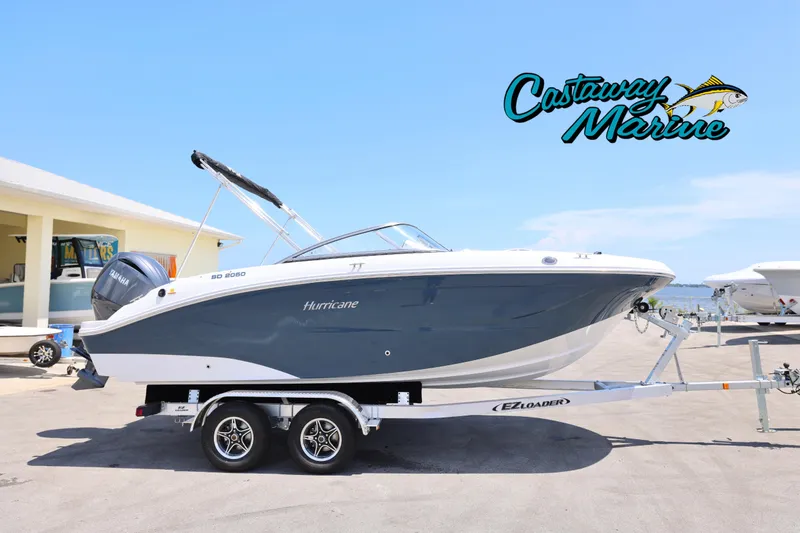 The Image of 2026 Hurricane SunDeck 2050 OB boat on trailer at Castaway Marine dealership. - 0