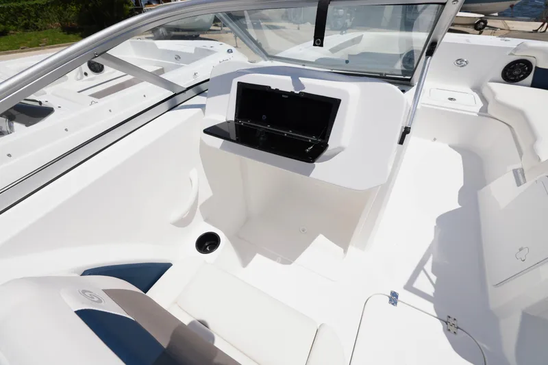 Slide: The Image of 2026 Hurricane SunDeck 2050 OB boat interior with modern dashboard and seating. - 11