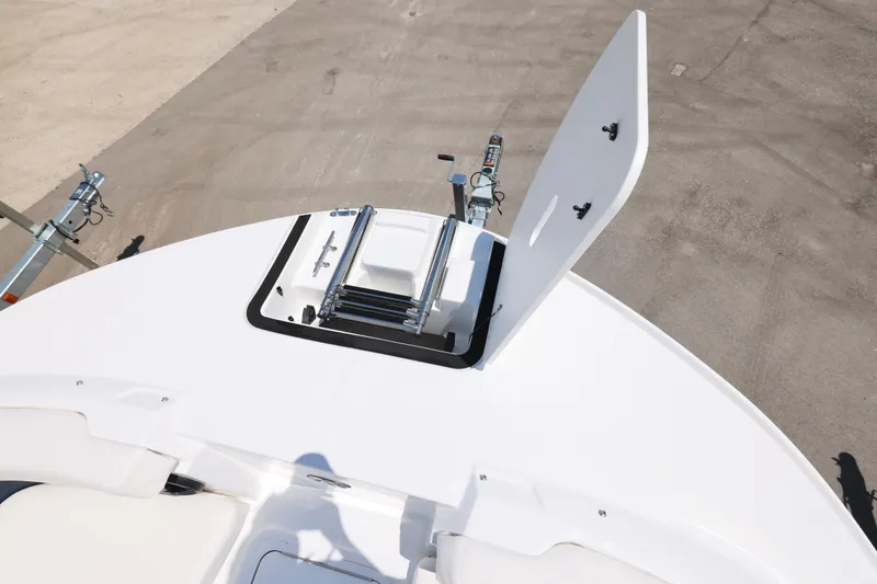 Slide: The Image of 2026 Hurricane SunDeck 2050 OB boat with spacious seating and sleek design. - 13