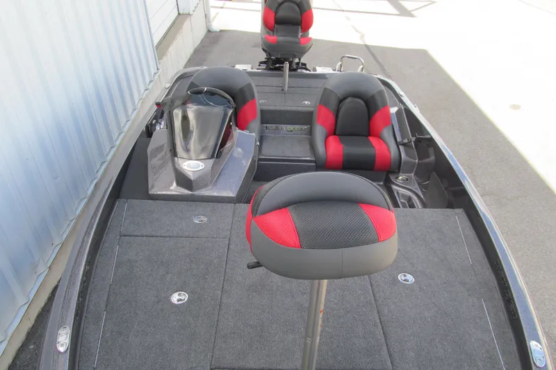 Slide: The Image of 2026 Ranger Z185 boat interior with red and black seating, featuring a sleek design. - 10