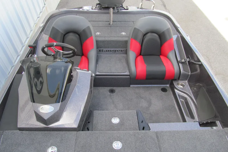 Slide: The Image of 2026 Ranger Z185 boat interior with dual seats and steering console. - 11