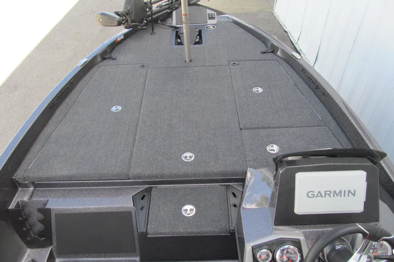 Slide: The Image of 2026 Ranger Z185 boat deck with Garmin navigation system, featuring spacious storage compartments. - 7
