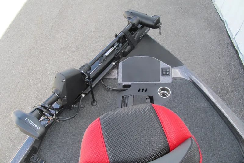 Slide: The Image of 2026 Ranger Z185 boat deck with Garmin trolling motor and red-black seat. - 9