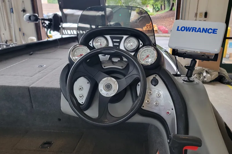 Slide: The Image of 2015 Tracker Pro Team 175 TXW boat dashboard with Lowrance fish finder. - 5