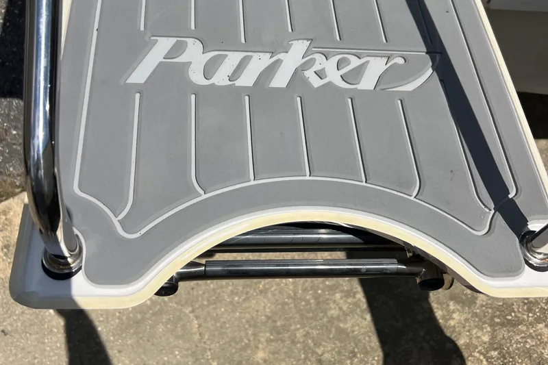 Slide: The Image of 2023 Parker 1801 Center Console boat deck with logo and stainless steel railing. - 15