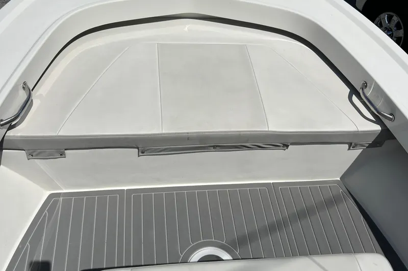 Slide: The Image of 2023 Parker 1801 Center Console boat interior with cushioned seating and sleek design. - 18