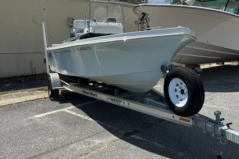 Slide: The Image of 2023 Parker 1801 Center Console boat on trailer in parking lot. - 3