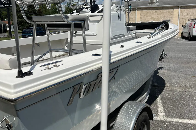 Slide: The Image of 2023 Parker 1801 Center Console boat on trailer in parking lot. - 9