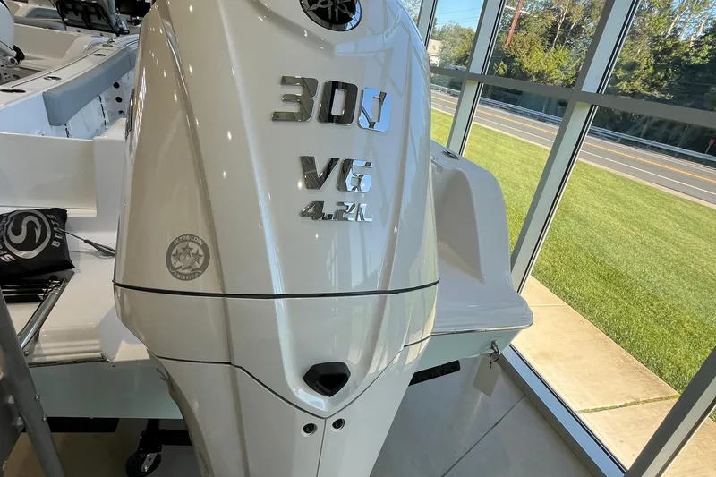 Slide: The Image of 2026 Sportsman Open 232 Center Console with 300 V6 engine, ultra-low emissions. - 7