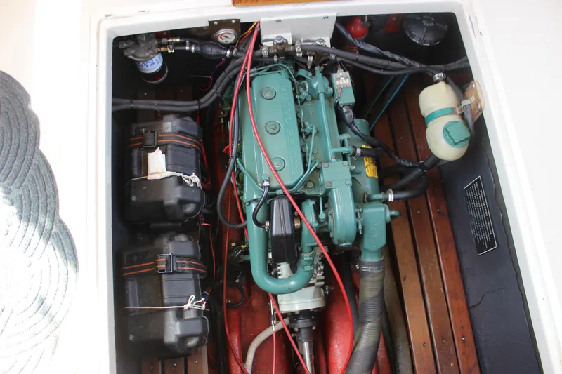 Slide: The Image of Engine compartment of 1988 Express Yachting Scout 30, showcasing detailed mechanical components. - 29