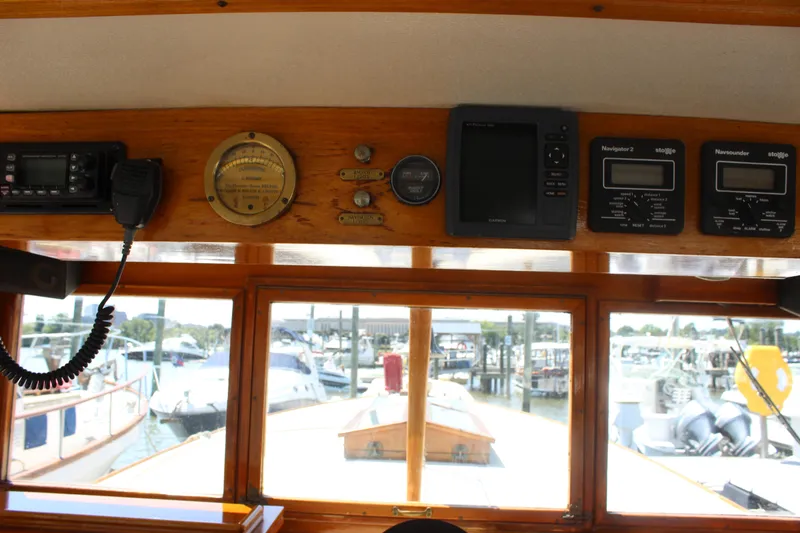 Slide: The Image of Interior view of 1988 Express Yachting Scout 30 with navigation instruments. - 30