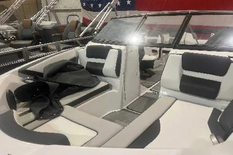 Slide: The Image of 2023 Yamaha Boats SX195 interior with sleek seating and modern design. - 2