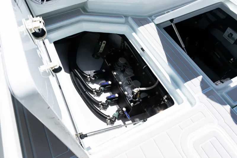 Slide: The Image of 2023 SeaVee 390Z boat on open water, featuring sleek design and spacious deck. - 13