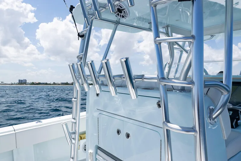 Slide: The Image of 2023 SeaVee 390Z boat compartment showcasing internal components and wiring. - 14