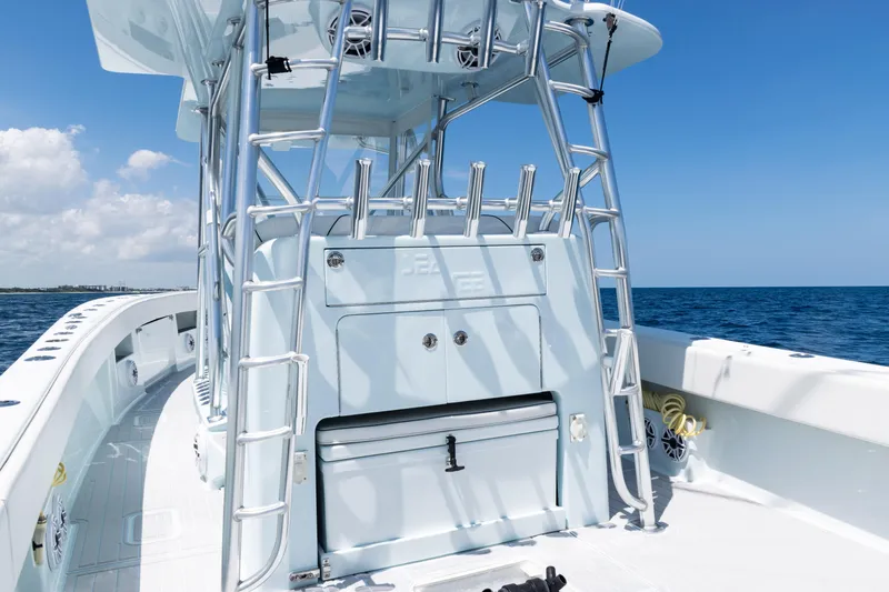 Slide: The Image of 2023 SeaVee 390Z boat dashboard with steering wheel and navigation screens. - 31