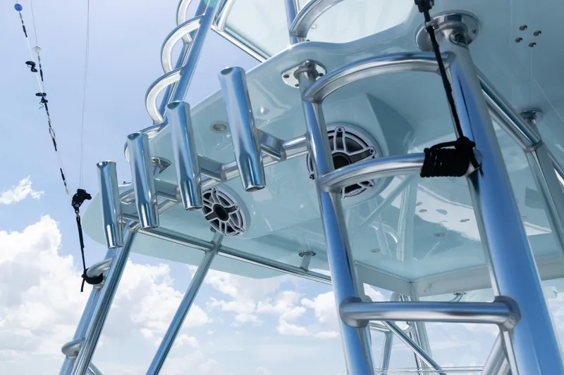 Slide: The Image of 2023 SeaVee 390Z boat tower against clear blue sky. - 56
