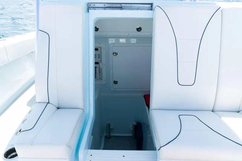 Slide: The Image of Interior view of 2023 SeaVee 390Z boat's control panel and sink area. - 60