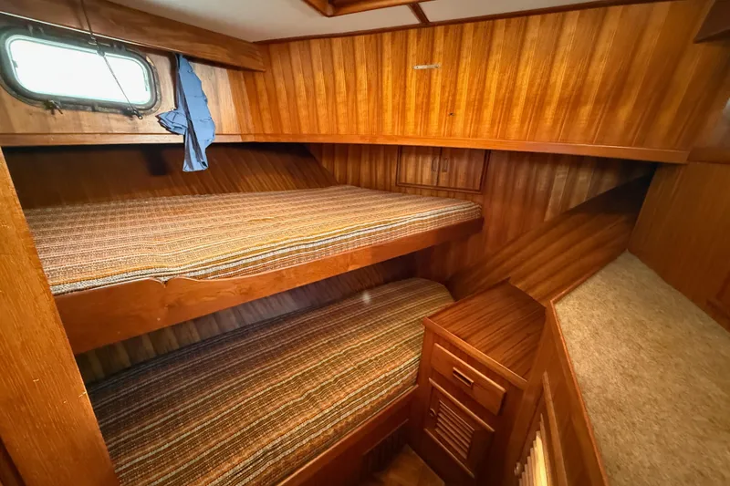 Slide: The Image of Cozy wooden cabin with bunk beds in 1983 CHB 41 Classic Trawler. - 9