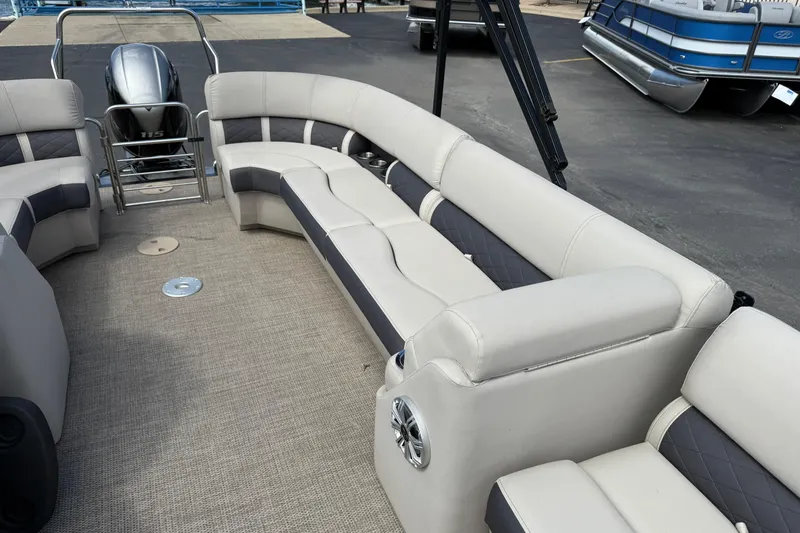 Slide: The Image of 2019 Bennington 22SX Premier pontoon boat interior with plush seating and modern design. - 17