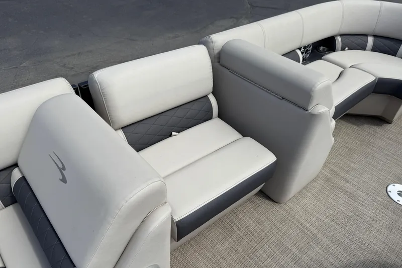 Slide: The Image of 2019 Bennington 22SX Premier boat interior with plush seating and elegant design. - 19