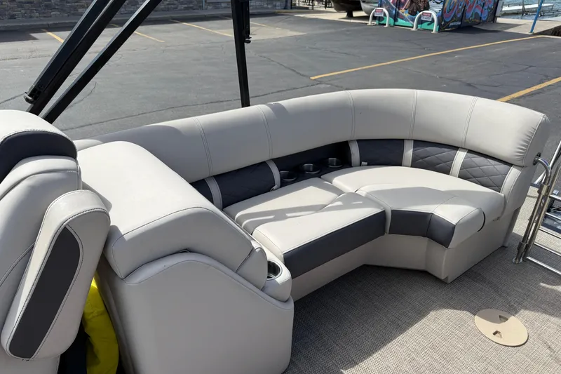 Slide: The Image of 2019 Bennington 22SX Premier boat with luxurious gray seating and cup holders. - 23