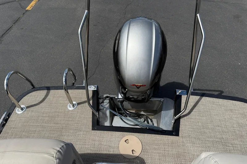 Slide: The Image of 2019 Bennington 22SX Premier boat with outboard motor and deck view. - 24