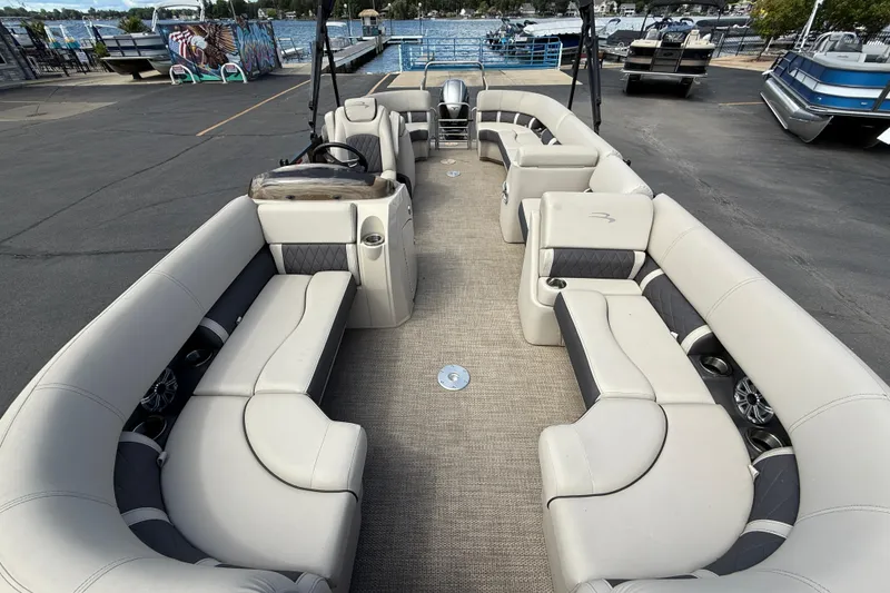 Slide: The Image of 2019 Bennington 22SX Premier pontoon boat with spacious seating and elegant design. - 8