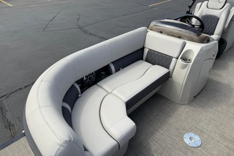 Slide: The Image of 2019 Bennington 22SX Premier boat interior with luxurious seating and modern design. - 9