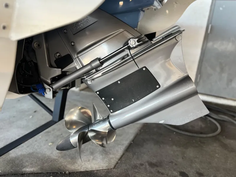 Slide: The Image of Close-up of 2022 Chaparral 23 Surf boat propeller and lower unit. - 25