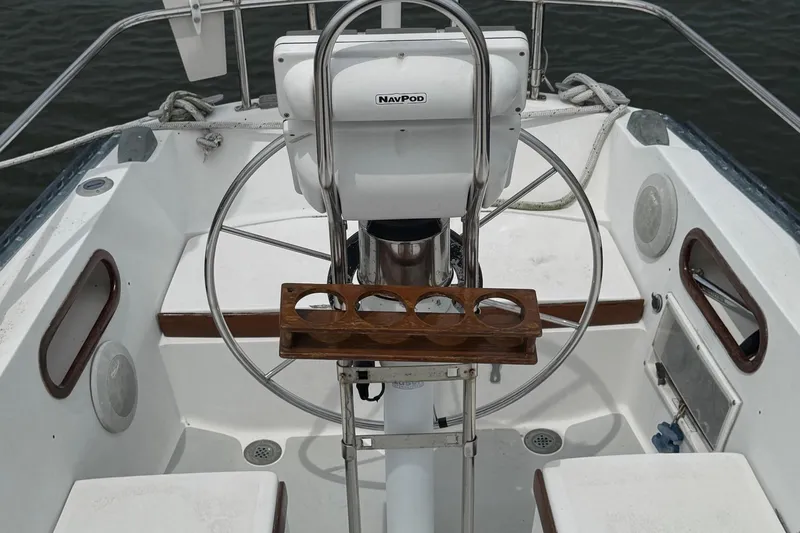 Slide: The Image of Cockpit of 1986 Catalina 38 sailboat with steering wheel and NavPod system. - 9