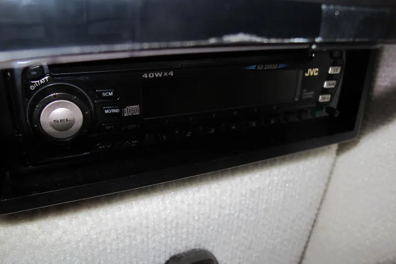 Slide: The Image of JVC stereo system in 2000 Chaparral 230 SSi boat, featuring 40W x 4 output. - 14