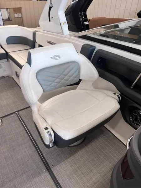 Slide: The Image of 2021 Chaparral 307 SSX boat interior with luxurious seating and modern design. - 13