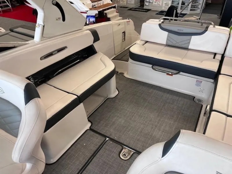 Slide: The Image of Interior of a 2021 Chaparral 307 SSX boat with luxurious seating. - 15