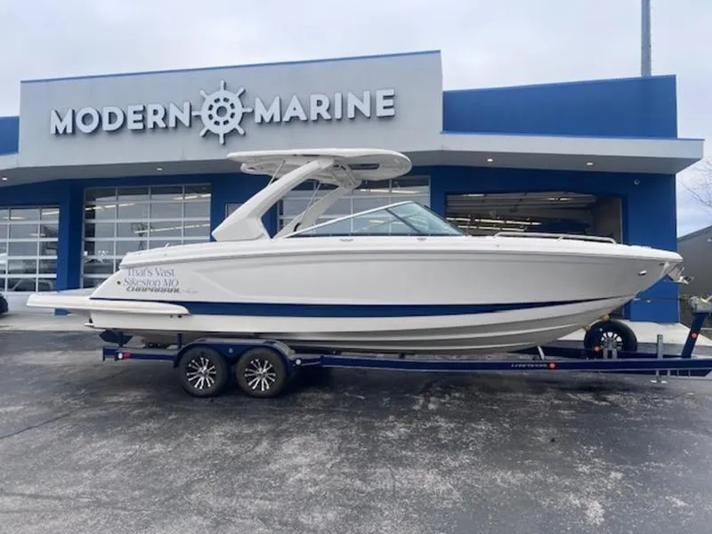 Slide: The Image of 2021 Chaparral 307 SSX boat on trailer at Modern Marine dealership. - 3