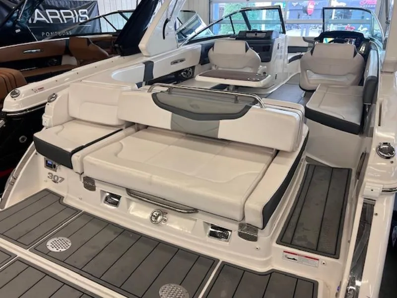 Slide: The Image of 2021 Chaparral 307 SSX boat interior with luxurious seating and modern design. - 31