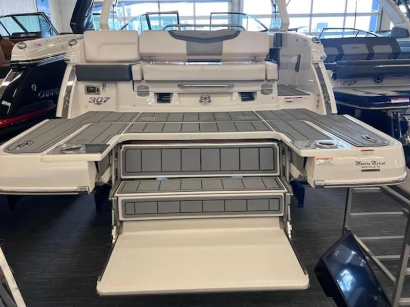 Slide: The Image of 2021 Chaparral 307 SSX boat with extended swim platform and seating area. - 33