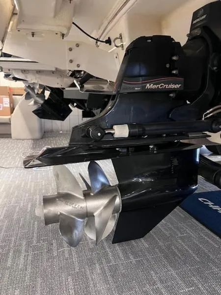 Slide: The Image of 2021 Chaparral 307 SSX boat with MerCruiser engine and propeller system. - 36