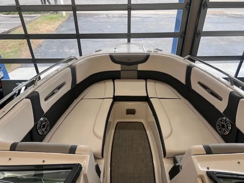 Slide: The Image of 2021 Chaparral 307 SSX boat interior with spacious seating and modern design. - 9