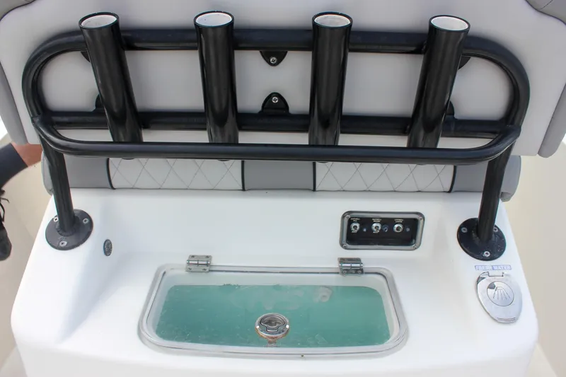 Slide: The Image of 2017 NauticStar 2602 Legacy boat with Yamaha 150 engines at dock. - 16