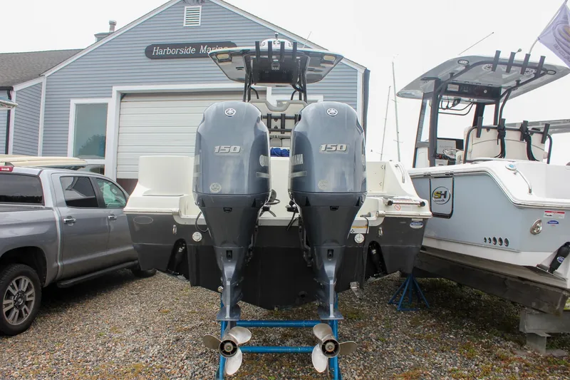 Slide: The Image of 2017 NauticStar 2602 Legacy boat docked at Harborside Marina. - 3